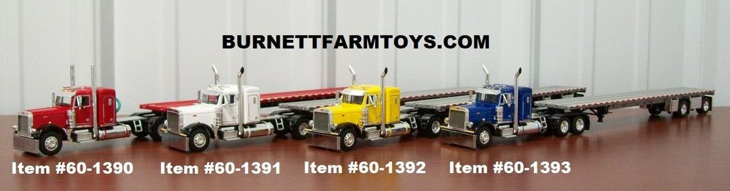 Four More Peterbilt with Flatbed Trailers