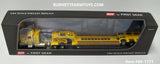 Item #60-1171 Yellow Peterbilt 389 Pride-N-Class 36-inch Flattop Sleeper with Yellow Tri-Axle Fontaine Magnitude Lowboy Trailer with Detachable Neck - 1/64 Scale - DCP by First Gear - Note: Spots on Cab Bumper - Sold As-Is