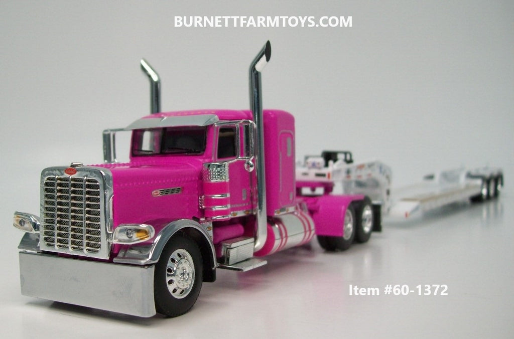 http://burnettfarmtoys.com/cdn/shop/files/60-1372PinkPeterbilt389Pride-N-Class36-inchSleeperwithWhiteLowboyTrailerA_1024x1024.jpg?v=1697469972