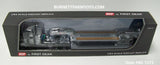 Item #60-1373 Silver Black Peterbilt 389 36-inch Flattop Sleeper with Silver Tri-Axle Fontaine Magnitude Lowboy Trailer with Detachable Neck - 1/64 Scale - DCP by First Gear