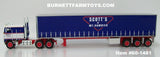 Item #60-1481 Scott's of Mt Gambier Blue White Red Kenworth K100 COE Flattop Sleeper with Tri-Axle Utility 53-foot Tautliner Flatbed Trailer - 1/64 Scale - DCP by First Gear