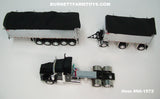 Item #60-1572 Black Kenworth T800 38-inch Sleeper with Chrome Sided Black Tarp Black Frame East Genesis II 31-foot and 20-foot Michigan Train End Dump Trailers - 1/64 Scale - DCP by First Gear