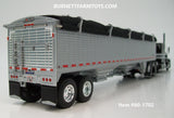 Item #60-1702 Black Silver Stripe Peterbilt 389 63-inch Flattop Sleeper with Silver High Sided Black Tarp Silver Frame Tandem Axle Wilson 43-foot Pacesetter Hopper Bottom Grain Trailer - 1/64 Scale - DCP by First Gear