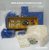 Item #13982 New Holland 81-piece Dairy Farm Set with Accessories - 1/64 Scale - Ertl / Tomy