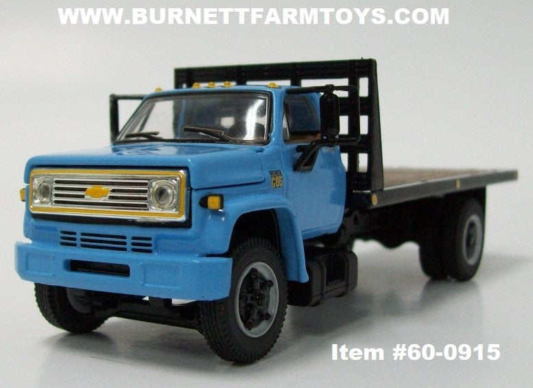 Item 60 0915 Blue Chevrolet C65 Flatbed Truck with Single Axle Wood Floor Black Frame Flatbed 1 64 Scale Note Bed Does Not Tilt