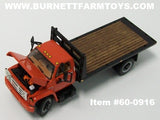 Item #60-0916 Orange GMC 6500 Flatbed Truck with Single Axle Wood Floor Black Frame Flatbed - 1/64 Scale - Note: Bed Does Not Tilt