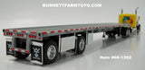 Item #60-1392 Yellow Black Fender Long Frame Peterbilt 379 36-inch Flattop Sleeper with Silver Deck Black Frame Spread Axle Wilson Roadbrute Flatbed Trailer - 1/64 Scale - DCP by First Gear