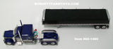 Item #60-1460 Blue Silver Gold Peterbilt 389 63-inch Flattop Sleeper with Black Sided Black Tarp Silver Frame Tandem Axle Wilson Commander Hopper Bottom Grain Trailer with Chrome End Caps - 1/64 Scale - DCP