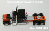 Item #CAB 1228 Black Orange Peterbilt 389 63-inch Flattop Sleeper - 1/64 Scale - DCP
