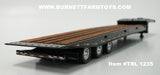 Item #TRL 1235 Black Tri-Axle Talbert 5553TA Slide Axle Flatbed Trailer - 1/64 Scale - DCP