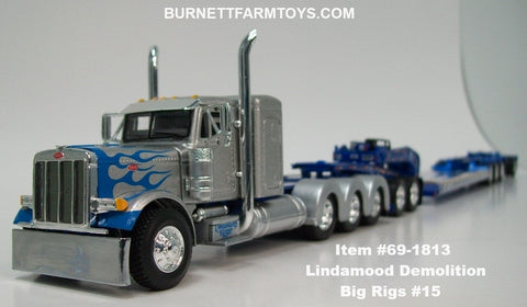 Item #69-1813 Lindamood Demolition Silver Blue Tri-Axle Peterbilt 379 36-inch Flattop Sleeper with Blue Tri-Axle Heavy Haul Fontaine Magnitude Lowboy with Jeep and Stinger - Big Rigs #15 - 1/64 Scale – DCP by First Gear