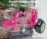 Item #47529 New Holland Pink Survivor Pulling Tractor - 1/64 Scale - Ertl / Tomy