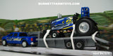 Item #47570 New Holland Blue Barracuda Pulling Tractor with Pickup Truck and Flatbed Gooseneck Trailer - 1/64 Scale – Ertl / Tomy