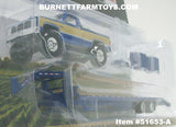 Item #51653-A Blue Gold Silver 1987 Lifted GMC K-2500 Pickup Truck with Toolbox and Blue Tandem Axle Flatbed Gooseneck Trailer with Ramps - 1/64 Scale - Greenlight