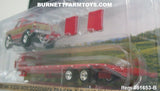 Item #51653-B Red Gold Silver 1987 Lifted GMC K-2500 Pickup Truck with Toolbox and Red Tandem Axle Flatbed Gooseneck Trailer with Ramps - 1/64 Scale - Greenlight