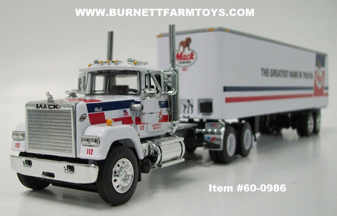 Item #60-0986 Mack Trucks White Blue Stripe Red Stripe Long Frame Mack Superliner Day Cab with White Blue Red Tandem Axle 40-foot Vintage Dry Goods Van Trailer - 1/64 Scale - DCP