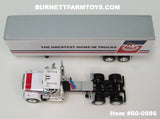 Item #60-0986 Mack Trucks White Blue Stripe Red Stripe Long Frame Mack Superliner Day Cab with White Blue Red Tandem Axle 40-foot Vintage Dry Goods Van Trailer - 1/64 Scale - DCP - Note: Paint Smear on Cab and Black Line on Trailer Roof - Sold As-Is