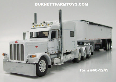 Item #60-1245 White Tri-Axle Peterbilt 389 70-inch Mid Roof Sleeper with White Sided Black Tarp Silver Frame Tri-Axle MAC Framed Coal Dump Trailer - 1/64 Scale – DCP by First Gear