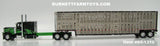 Item #60-1310 Bottomley Enterprises Big Daddy Black Green Long Frame Peterbilt 389 63-inch Flattop Sleeper with Silver Sided Black Trim Tandem Axle Wilson Silver Star Livestock Trailer - 1/64 Scale - DCP by First Gear