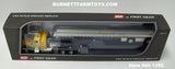 Item #60-1392 Yellow Black Fender Peterbilt 379 36-inch Flattop Sleeper with Silver Deck Black Frame Spread Axle Wilson Roadbrute Flatbed Trailer - 1/64 Scale – DCP by First Gear