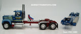 Item #60-1480 Sid Kamp Blue Burgundy Gold Outline Mack Superliner Day Cab with Blue Tri-Axle Fontaine Magnitude Lowboy Trailer - 1/64 Scale - DCP by First Gear