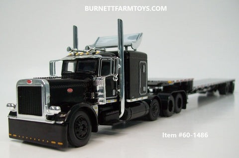 Item #60-1486 Black Tri-Axle Peterbilt 389 63-inch Flattop Sleeper with Turbo Wing and Silver Deck Black Frame Spread Axle Transcraft Stepdeck Trailer - 1/64 Scale - DCP by First Gear