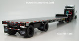 Item #60-1486 Black Tri-Axle Peterbilt 389 63-inch Flattop Sleeper with Turbo Wing and Silver Deck Black Frame Spread Axle Transcraft Stepdeck Trailer - 1/64 Scale - DCP by First Gear