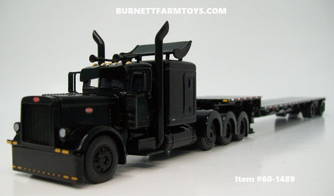 Item #60-1489 All Black Tri-Axle Peterbilt 389 63-inch Flattop Sleeper with Turbo Wing and All Black Spread Axle Transcraft Stepdeck Trailer - 1/64 Scale - DCP by First Gear