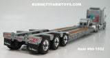 Item #60-1552 Silver Peterbilt 379 63-inch Mid Roof Sleeper with Silver Tri-Axle Talbert Lowboy Trailer with Detachable Neck - 1/64 Scale - DCP by First Gear