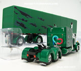 Item #60-1607 Green Black Gray Peterbilt 359 63-inch Mid Roof Sleeper with Green Black Gray Sided Black Frame Spread Axle Utility Roll Tarp Flatbed Trailer - 1/64 Scale - DCP by First Gear