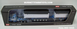 Item #60-1633 Wisteria Blue White Kenworth W900L Day Cab with White Sided Black Tarp Wisteria Blue Frame East Genesis II 31-foot and 20-foot Michigan Train End Dump Trailers - 1/64 Scale – DCP by First Gear