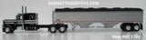 Item #60-1702 Black Silver Stripe Peterbilt 389 63-inch Flattop Sleeper with Silver High Sided Black Tarp Silver Frame Tandem Axle Wilson 43-foot Pacesetter Hopper Bottom Grain Trailer - 1/64 Scale - DCP by First Gear