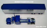 Item #60-1735 Blue Metallic Peterbilt 389 63-inch Mid Roof Sleeper with Chrome Ribbed Sided Blue Metallic Spread Axle Utility Refrigerated Trailer with Thermo King Refrigerator - 1/64 Scale – DCP by First Gear