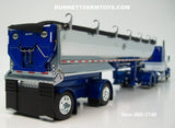 Item #60-1740 Blue Metallic White Peterbilt 389 63-inch Mid Roof Sleeper with Chrome Sided Black Tarp Blue Metallic Frame Spread Axle MAC Round Dump Trailer - 1/64 Scale – DCP by First Gear