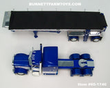 Item #60-1740 Blue Metallic White Peterbilt 389 63-inch Mid Roof Sleeper with Chrome Sided Black Tarp Blue Metallic Frame Spread Axle MAC Round Dump Trailer - 1/64 Scale – DCP by First Gear