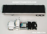 Item #60-1764 White Peterbilt 379 Day Cab with White Sided Black Tarp Silver Frame Tandem Axle Wilson Pacesetter 43-foot Hopper Bottom Grain Trailer - 1/64 Scale - DCP by First Gear
