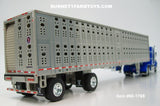 Item #60-1769 Three-Toned Blue White Outline Ford LTL 9000 60-inch Aerodyne Sleeper with Silver Spread Axle Wilson PSAL Stockmaster Hog Livestock Trailer - 1/64 Scale – DCP by First Gear