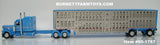 Item #60-1787 Baby Blue White Stripe Black Outline Long Frame Peterbilt 389 63-inch Mid Roof Sleeper with Silver Sided Baby Blue Trim Spread Axle Wilson Silver Star Livestock Trailer - 1/64 Scale - DCP by First Gear