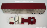 Item #60-1837 Cream Burgundy Peterbilt 389 36-inch Flattop Sleeper with Silver Burgundy Trim Spread Axle Wilson Silver Star Livestock Trailer - 1/64 Scale – DCP by First Gear