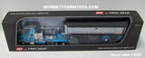 Item #60-1893 Cyan Blue Peterbilt 379 with Chrome Vintage 60-inch Sleeper and Chrome Sided Black Tarp Black Frame Cyan Blue Fender Spread Axle MAC Frameless Coal Dump Trailer - 1/64 Scale – DCP by First Gear