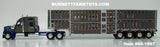 Item #60-1897 Gun Metal Gray Blue White Outline Kenworth W990 76-inch Mid Roof Sleeper with Gun Metal Gray Sided Silver Trim Quad Axle Wilson Silver Star Livestock Trailer - 1/64 Scale – DCP by First Gear