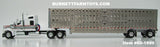 Item #60-1899 White Gray Red Outline Kenworth W990 76-inch Mid Roof Sleeper with Silver Spread Axle Wilson Silver Star Livestock Trailer - 1/64 Scale – DCP by First Gear