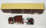 Item #60-1903 Brown Metallic Tan Red Outline Kenworth W990 76-inch Mid Roof Sleeper with Brown Metallic Tan Trim Spread Axle Wilson Silver Star Livestock Trailer - 1/64 Scale – DCP by First Gear