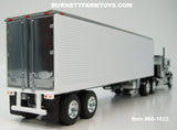 Item #60-1923 Black Gray GMC General 60-inch Flattop Sleeper with White Sided Silver Trim Silver Frame Tandem Axle Vintage 40-foot Refrigerated Trailer with Thermo King Refrigerator - 1/64 Scale – DCP by First Gear