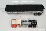 Item #60-1925 Cream Orange Brown Stripe Chevrolet Bison Day Cab with Chrome Black Tarp Silver Frame Tandem Axle EAST End Dump Trailer - 1/64 Scale – DCP by First Gear