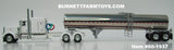 Item #60-1937 White Peterbilt 389 63-inch Flattop Sleeper with Polished Tandem Axle Brenner Sanitary Food Grade Tanker Trailer - 1/64 Scale – DCP by First Gear