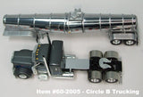 Item #60-2005 Circle B Trucking Gun Metal Gray Blue Stripe Silver Outline Peterbilt 389 36-inch Flattop Sleeper with Chrome Silver Tandem Axle Polar Deep Drop Tanker Trailer - 1/64 Scale – DCP by First Gear