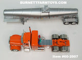 Item #60-2007 Orange Cream Black Outline Peterbilt 389 36-inch Flattop Sleeper with Silver Tandem Axle Polar Deep Drop Tanker Trailer - 1/64 Scale – DCP by First Gear