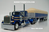 Item #60-2030 Galaxy Blue Tan Peterbilt 379 36-inch Flattop Sleeper with Galaxy Blue Sided Tan Tarp Galaxy Blue Frame Spread Axle Wilson Roadbrute 53-foot Flatbed Covered Wagon Trailer - 1/64 Scale – DCP by First Gear