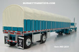 Item #60-2031 Turquoise White Peterbilt 379 36-inch Flattop Sleeper with Turquoise Sided Cream Tarp Turquoise Frame Spread Axle Wilson Roadbrute 53-foot Flatbed Covered Wagon Trailer - 1/64 Scale – DCP by First Gear